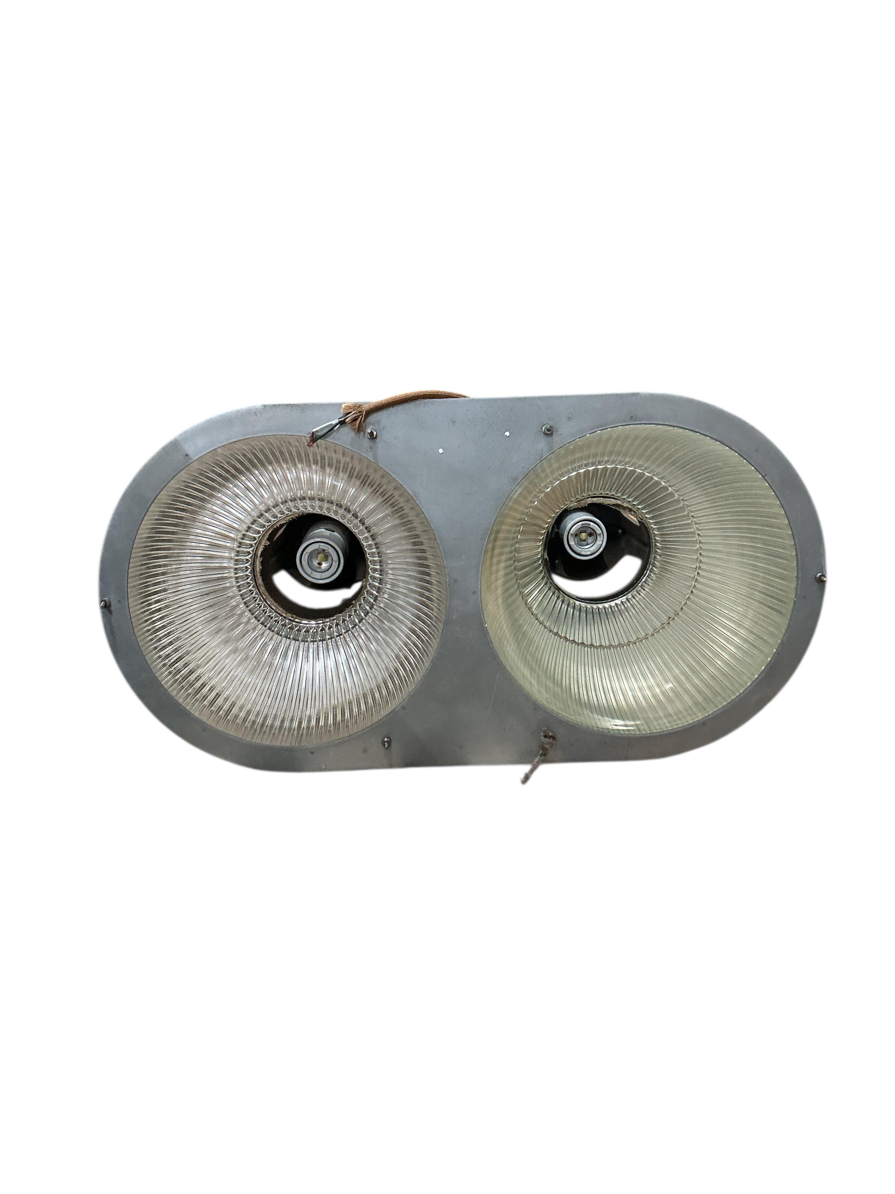 A pair of Holophane double industrial factory lights, width 64cm, height 42cm